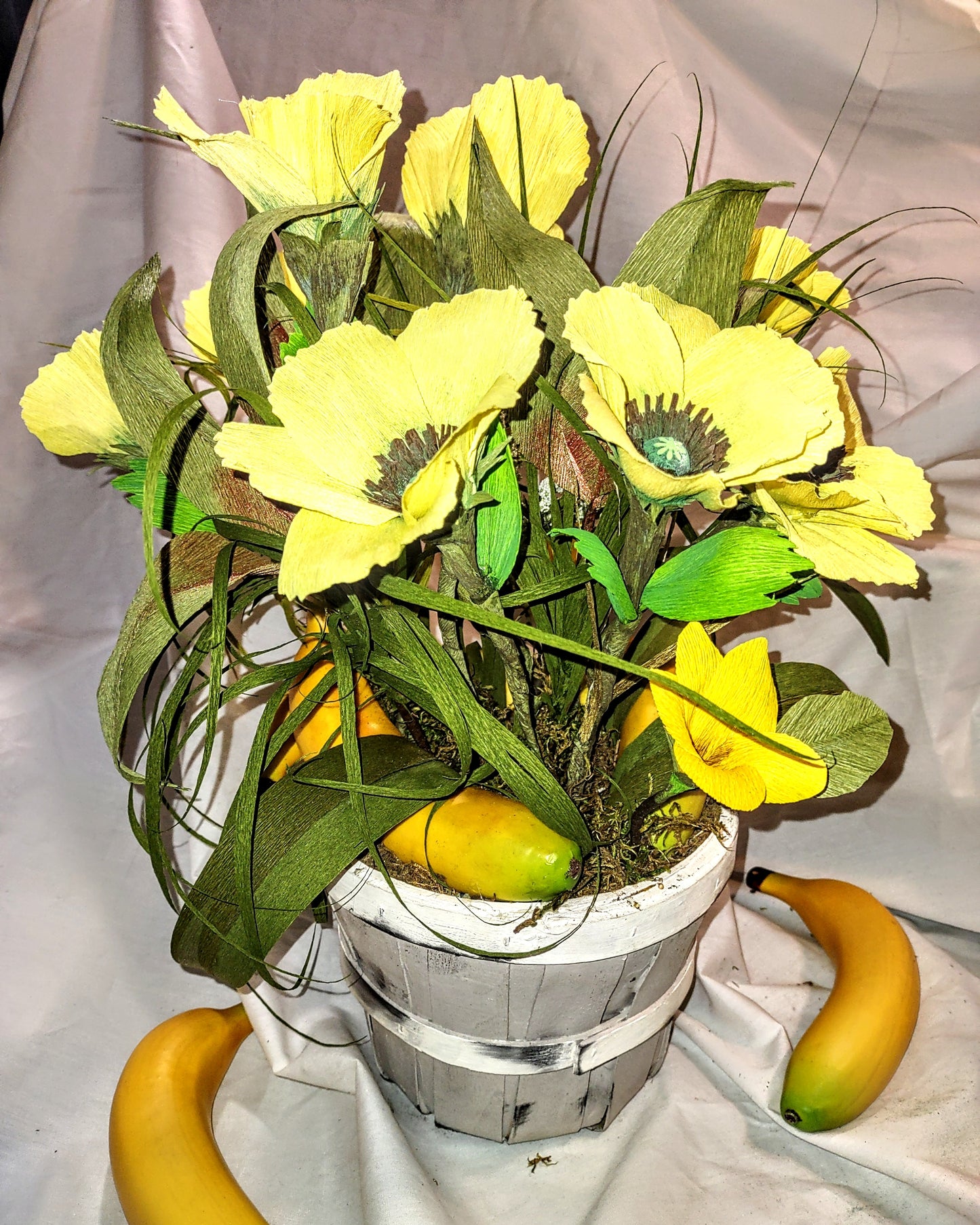 Poppies and Bananas in a Wooden Basket