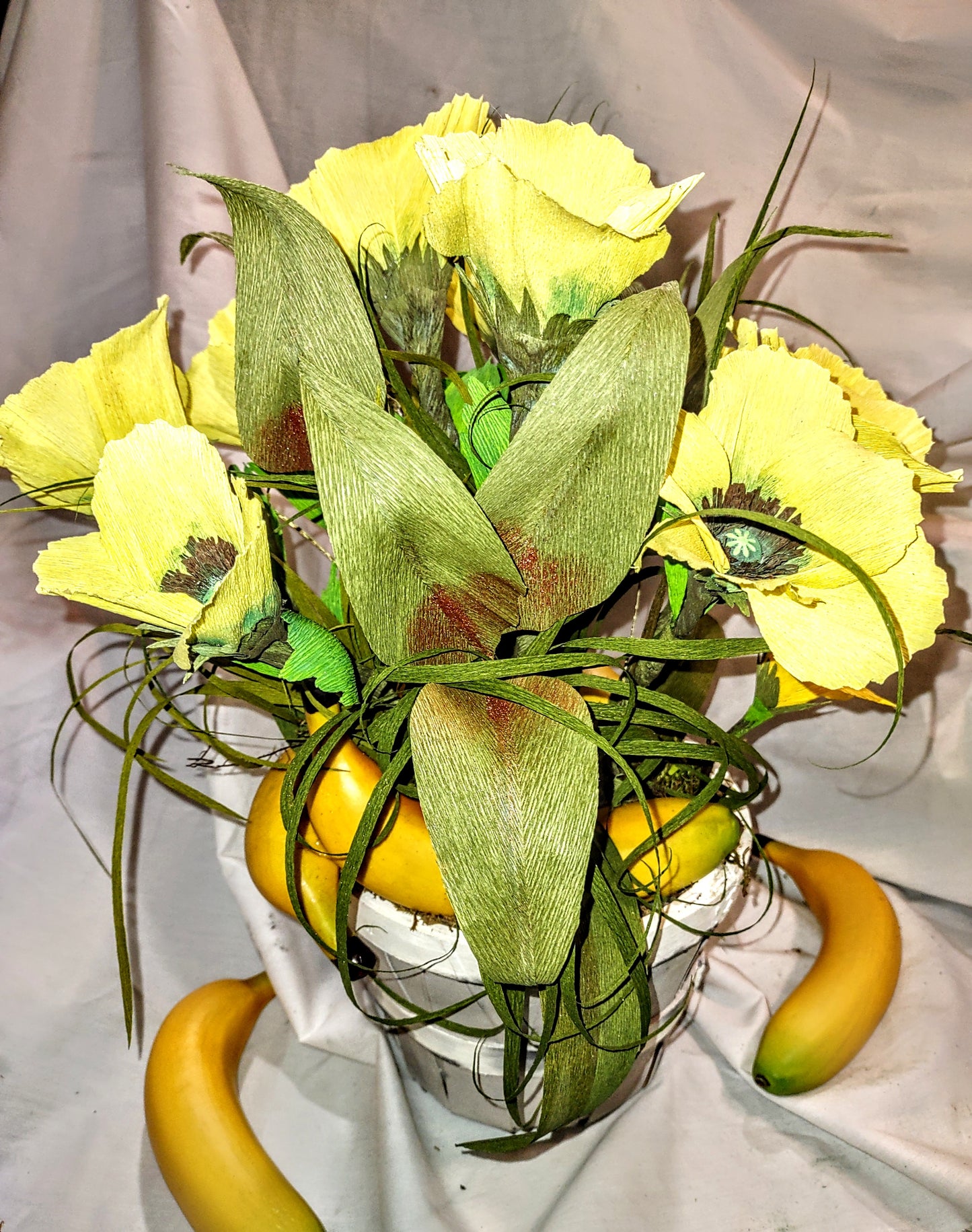 Poppies and Bananas in a Wooden Basket