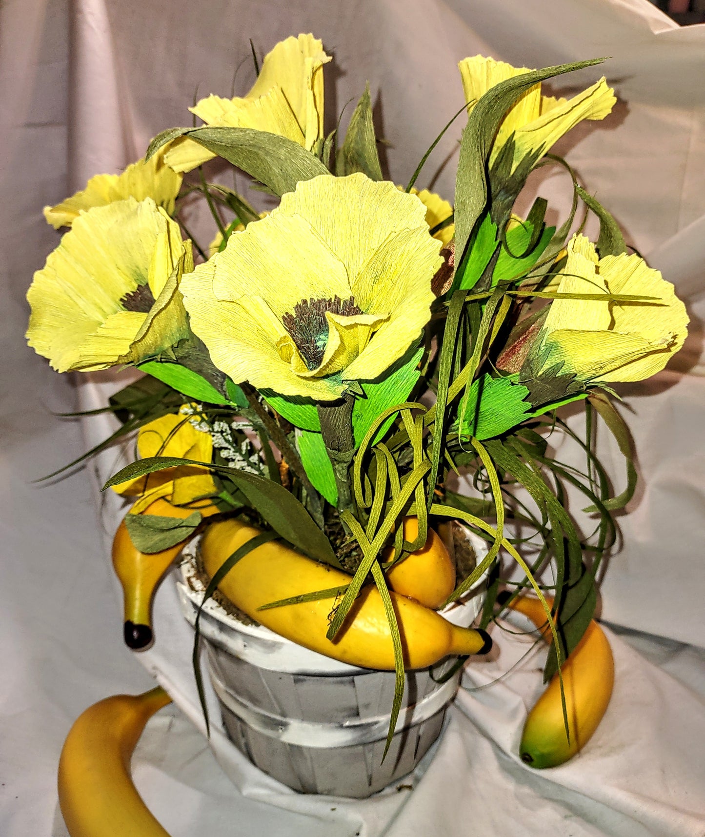Poppies and Bananas in a Wooden Basket